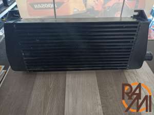 RADIATOR AT COMPLETION 76091095 (NEW)